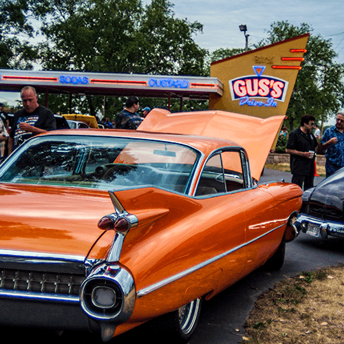 Classic Caddy at Gus’s Orange Cadillac parked in front of Gus's Drive-In, East Troy, near Lake Geneva